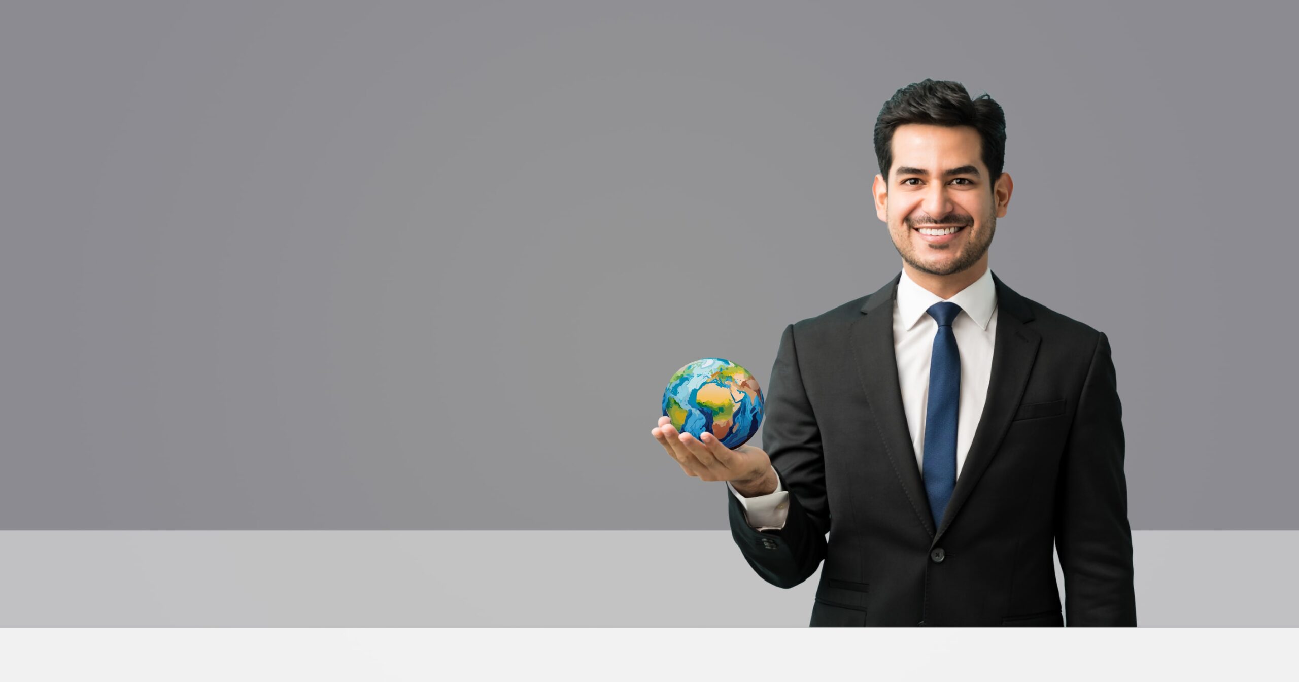 Man holding globe with his right hand